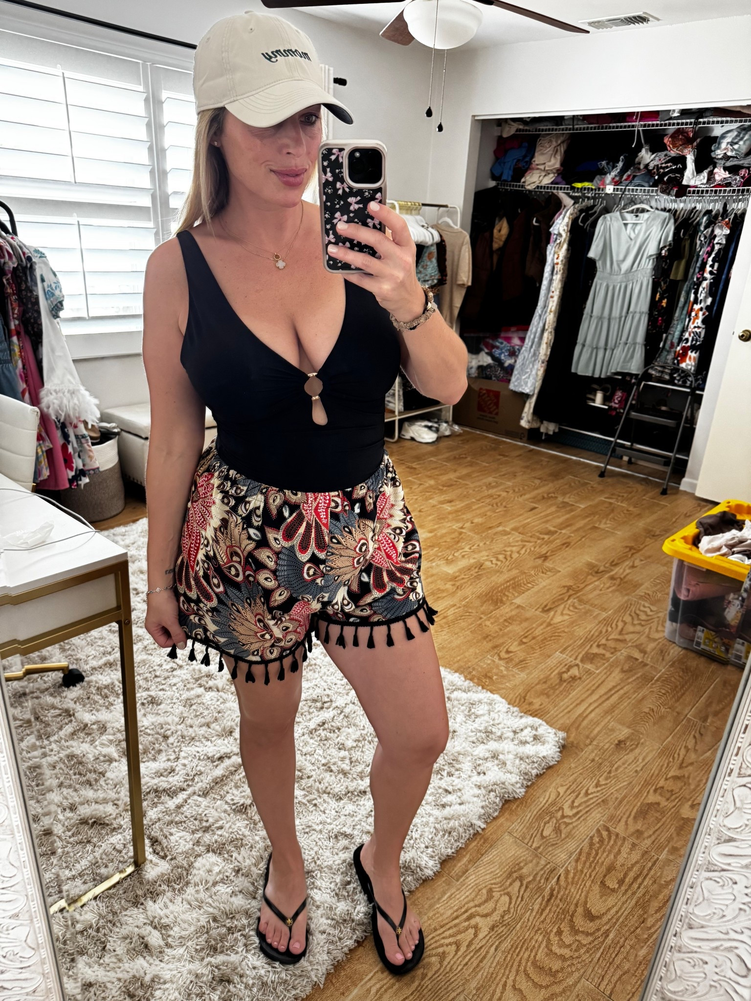 Beach outfit. 13 weeks pregnant. One piece swimsuit. Baseball cap. Shorts 


#LTKSwim #LTKootd #LTKBump