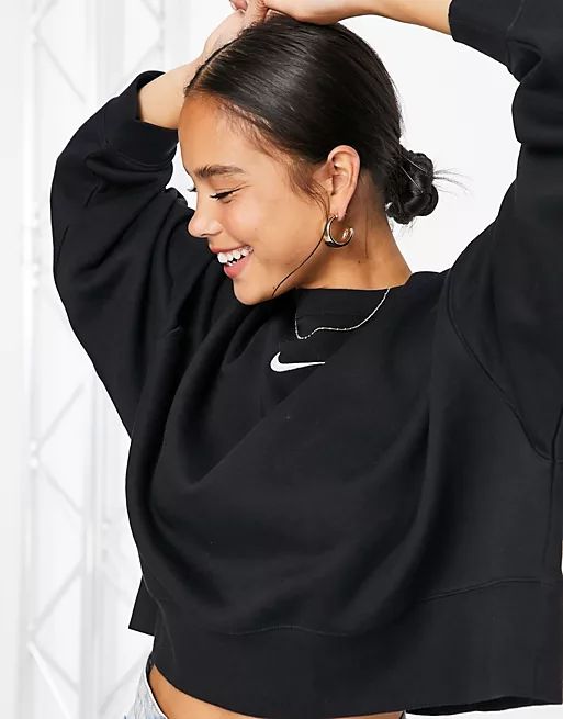 Nike mini Swoosh oversized boxy sweatshirt in black | ASOS (Global)