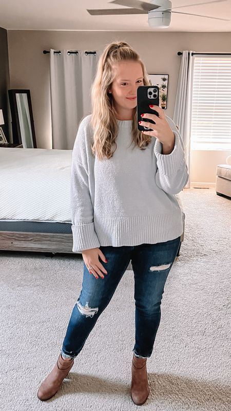 casual super soft sweater from amazon in light blue. runs big, wearing large, normally large/xl definitely size down if in between. normal length though so stay tts for a slightly longer fit. distressed denim and boots are on regular rotation. love these neutral booties for fall! wearing 10, normally 9.5, size up if I’m between  