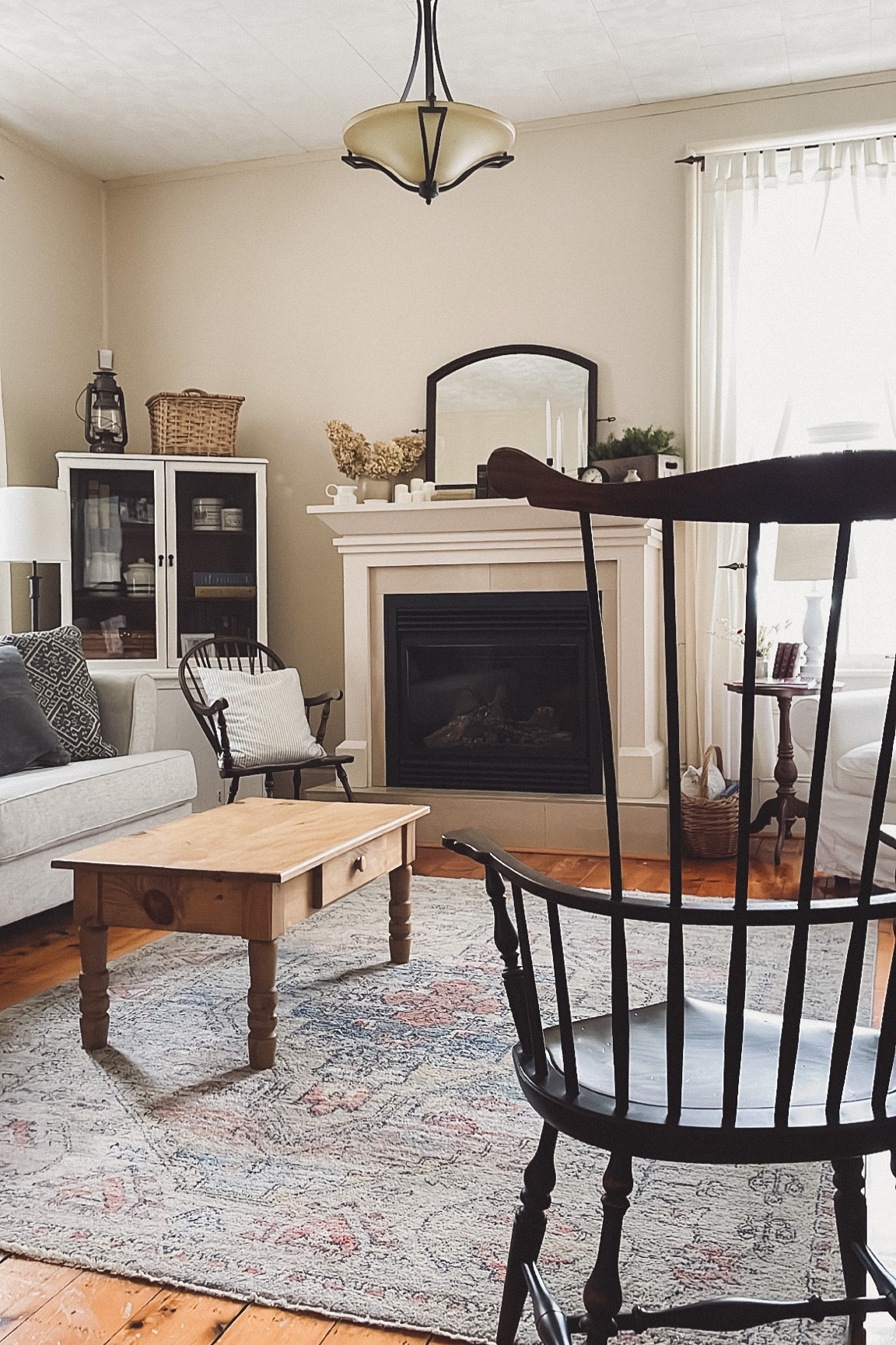 Cozy vintage living room with modern and antique finishes blended together for a serene space. 

#LTKhome #LTKFind