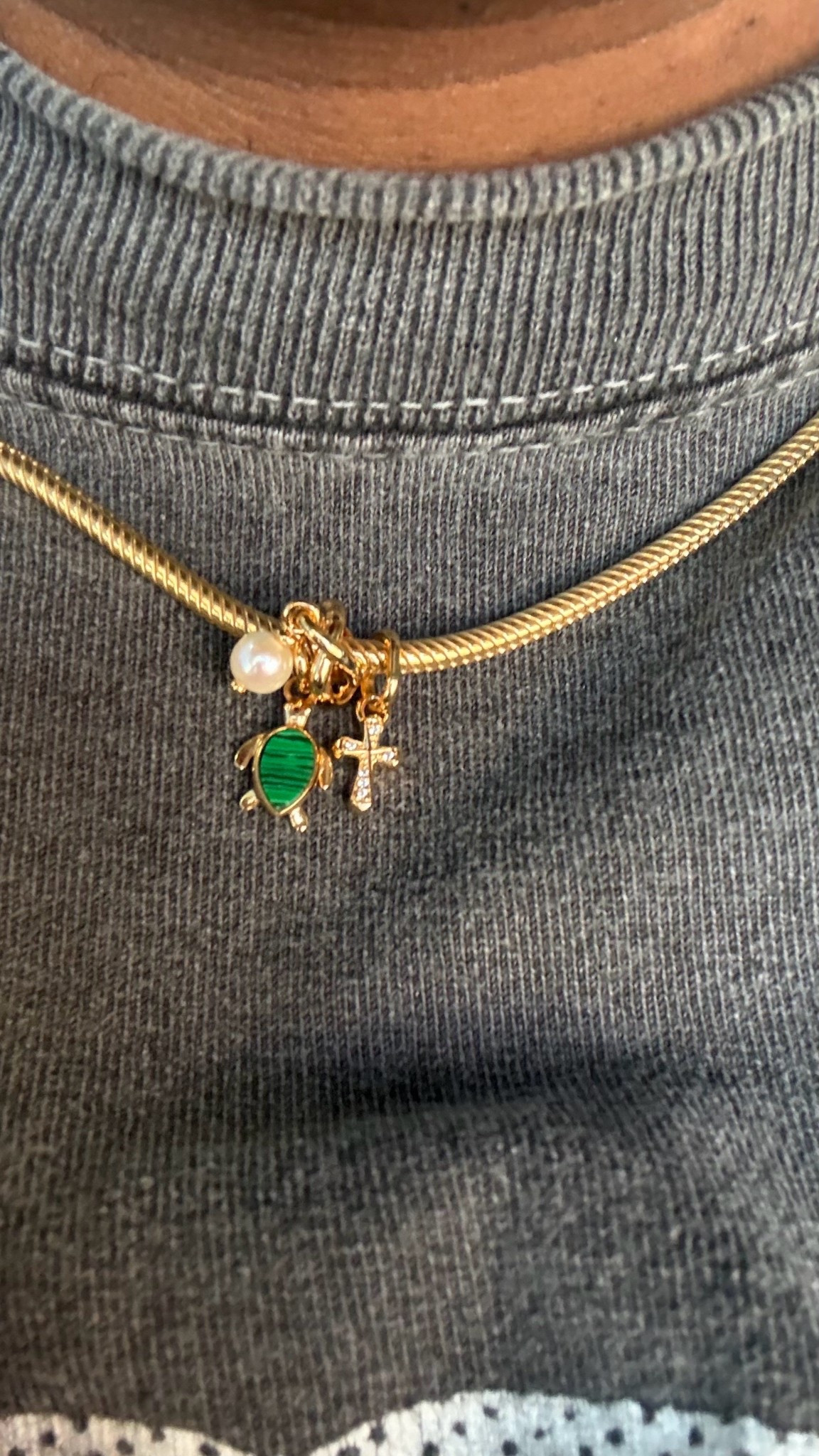 New Charm Necklace ✨ 

I currently have three charms, a turtle a pearl and a Cross. 

The gold cross is sold out, so I linked the Silver

#LTKGiftGuide #LTKStyleTip