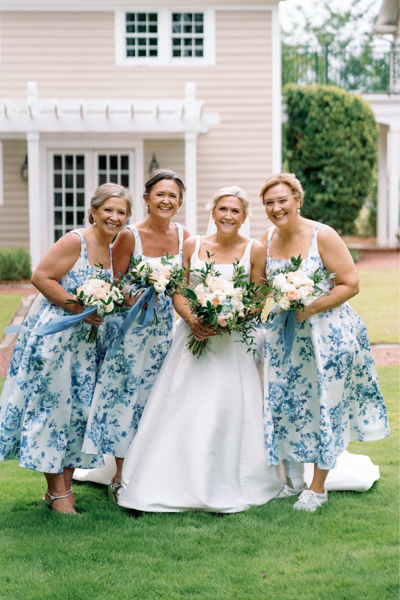 Wedding bridesmaids garden wedding blue and white 50 year old bride cousins family laughs giggles big day 

#LTKOver40 #LTKWedding #LTKFamily