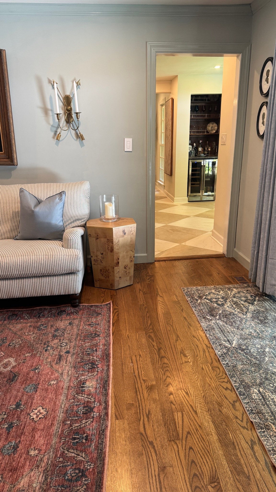 Classic home, classic style, striped couch, oushak look rugs, runner rugs, checkerboard tile floor, classic colonial style, den styling

#LTKHome