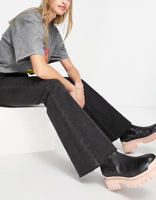 Reclaimed Vintage inspired The '86 super wide flare jean in washed black | ASOS (Global)