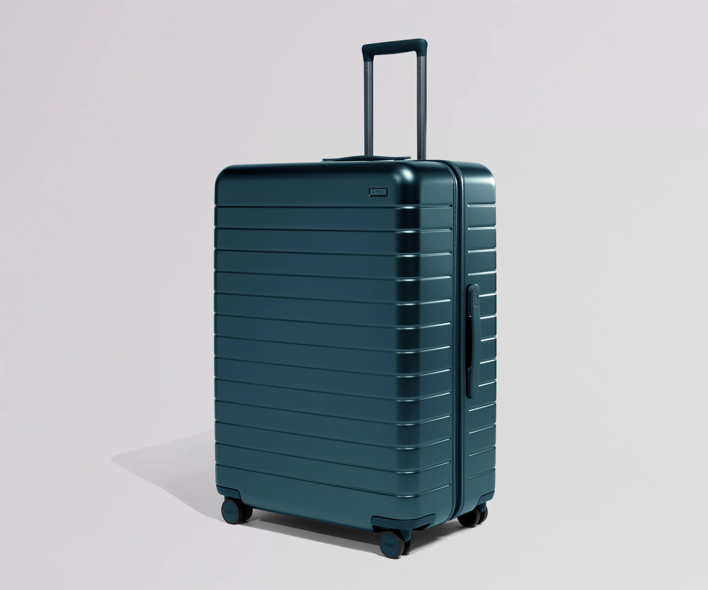 Shop Large & Checked Suitcases in Stormy Teal | Away | Away