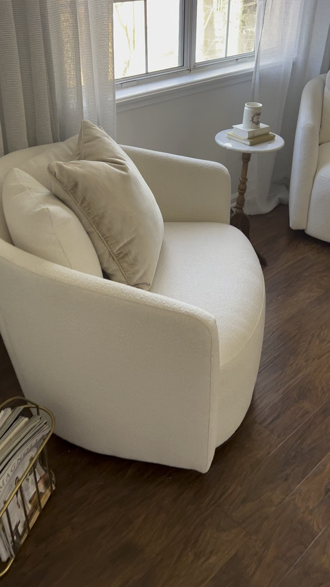 Love this chair so much I bought two! The best accent chair under $300 from Walmart! 360° swivel, super comfy, easy to assemble and comes with three pillows. Perfect for a living room or bedroom! 

Beautiful By Drew Barrymore line. Walmart find. Bucle accent chair. #walmart #furniture #livingroomfurniture #whitechair Transitional modern home decor 

#LTKfamily #LTKhome #LTKVideo