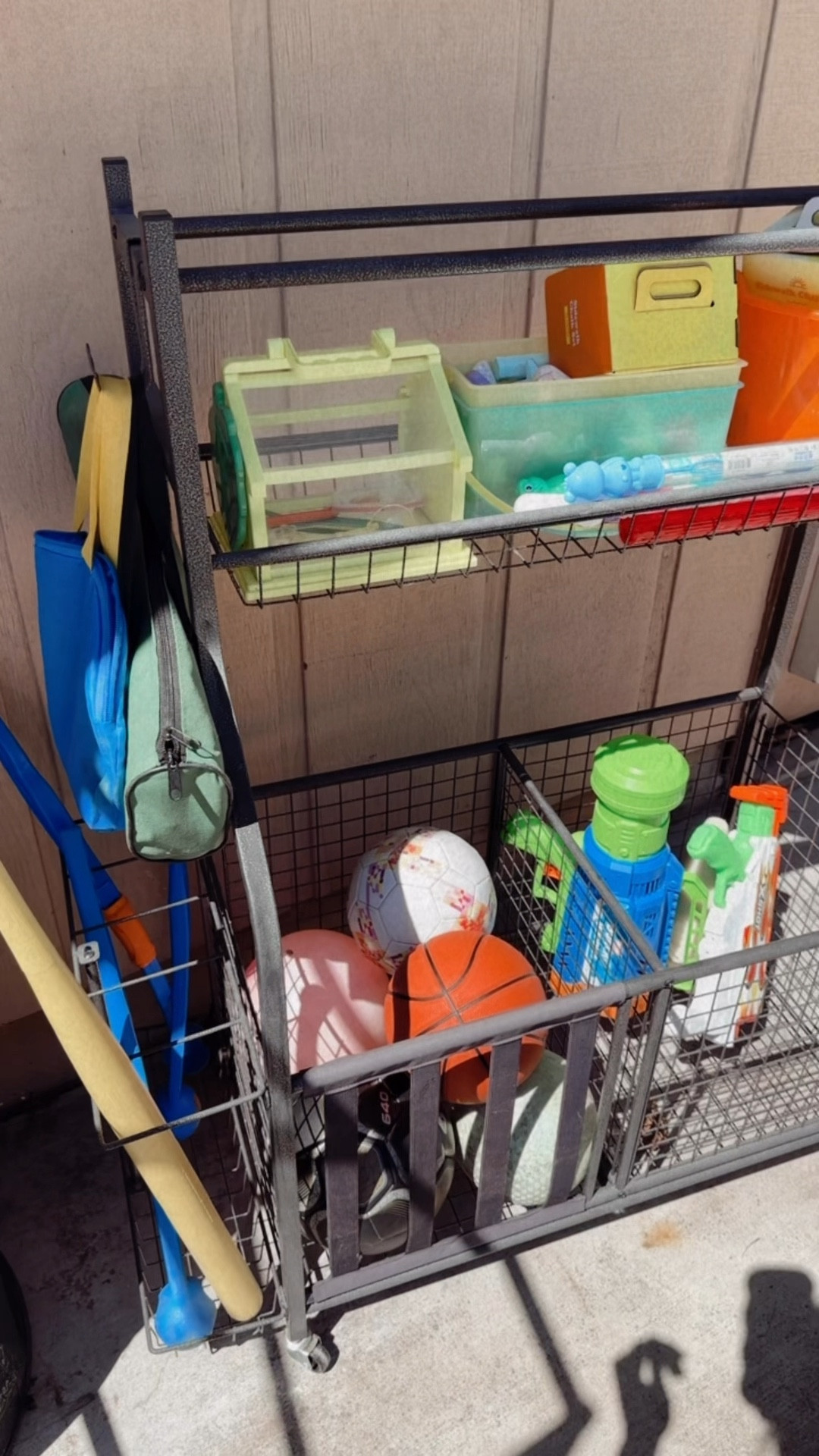 Best outdoor organizer. We just roll it in the garage for winter! 

#LTKHome #LTKFamily #LTKFindsUnder100