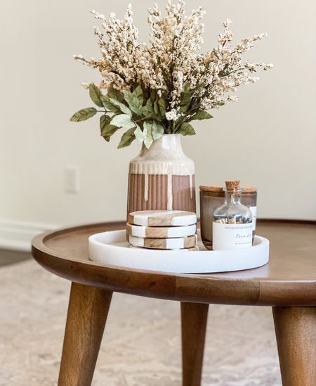 Fall coffee table style

#fallneutrals #coasters #marbletray 

#LTKhome
