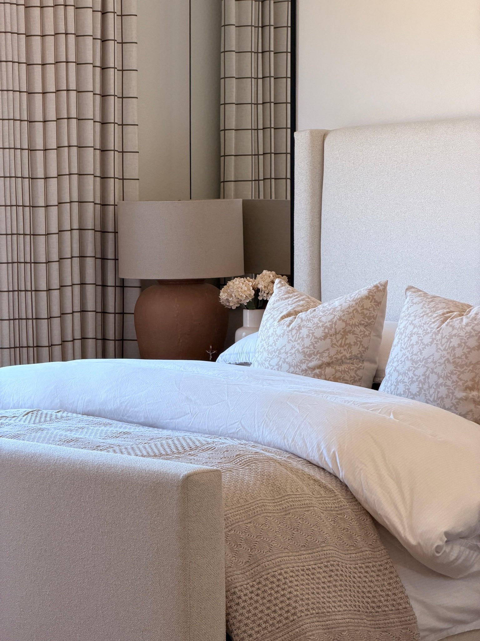 Primary bedroom | Bedroom decor | Cozy bedroom | Neutral bedroom | Bedroom inspiration | Traditional bedroom | Transitional bedroom | Timeless interiors | Warm neutral home | Upholstered bed | Neutral bedding | White bedding | Throw blanket | Decorative pillows | Bedroom curtains | Plaid curtains | Window treatments | Table lamp | Bedside styling | Cozy home | Collected home | Classic home decor | Nancy Meyers style | Home decor finds | Bedroom styling

#LTKdayinmylife #LTKHome #LTKSeasonal