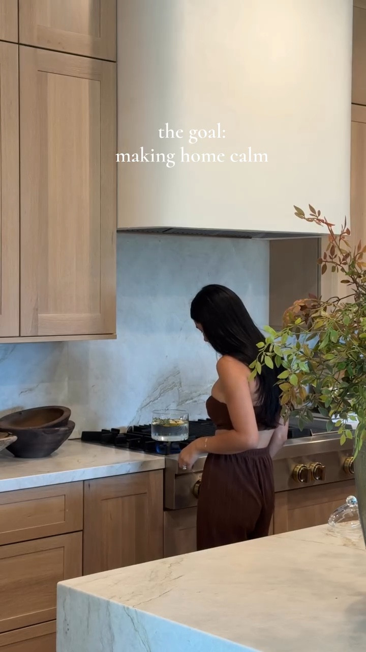 trying to make corners and everyday spaces as peaceful as I can 

storing things in pretty containers, using fruit and herbs from the backyard for summer pots, and spending as much time in the little outdoor oasis’ in our home