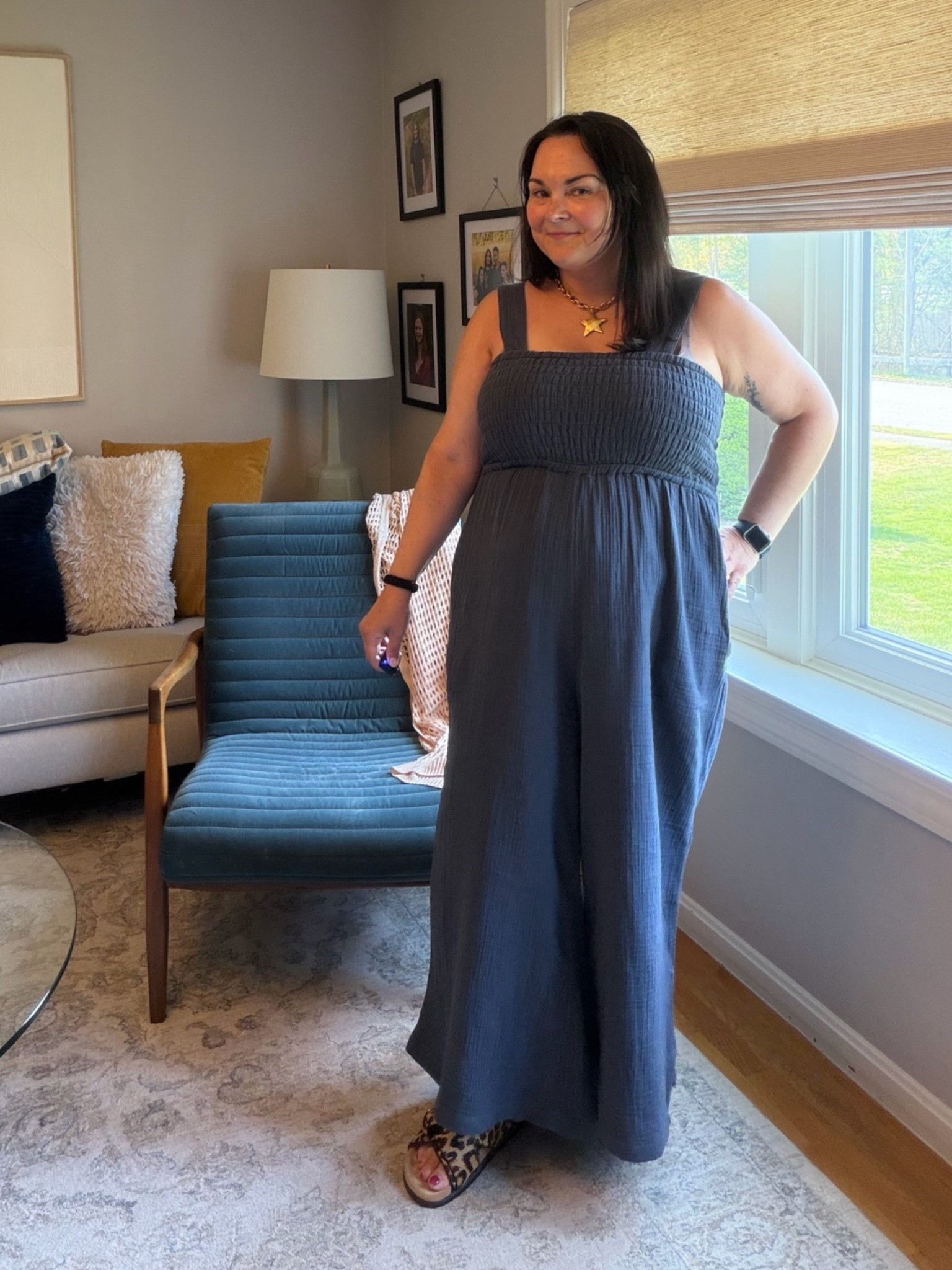 Comfy but still put together is honestly the hardest combo to find as a midsize woman.

This smocked jumpsuit is soft, lightweight, easy to move in, and actually comfortable sitting down all day. I paired it with my favorite comfy sandals, a denim jacket for layering, and simple gold jewelry for an easy real-life outfit that still feels polished.

Perfect for teacher outfits, casual dinners, errands, travel days, or summer events when you want to feel comfortable without looking underdressed.

📏 5’4” | midsize | size 14/16 | belly-forward fit

#LTKootd #LTKWorkwear #LTKMidsize