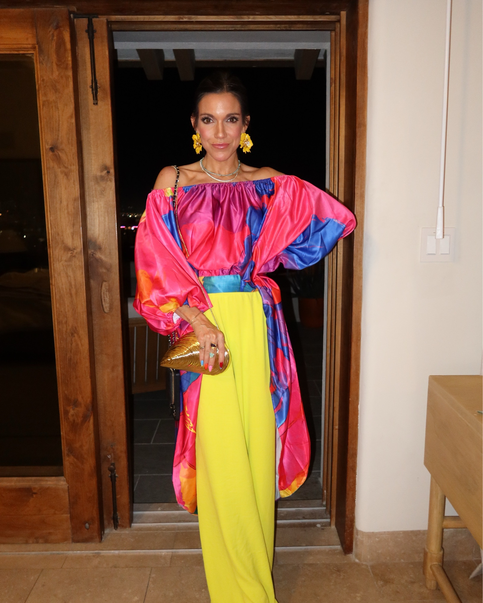 This outfit screams vacation! The high low blouse, is super light weight and has me feeling so chic!! Also, under $70! The pants are under $50!!

I pared it with statement jewelry, a gold shell vacation bag, and colorful heels 💃. 

#LTKTravel #LTKSeasonal #LTKootd