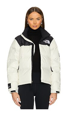 The North Face 1996 Retro Nuptse Jacket in White Dune from Revolve.com | Revolve Clothing (Global)