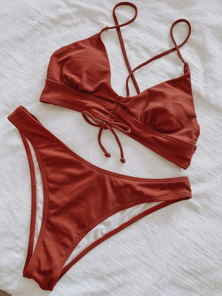 This another favorite 2 piece swimsuit from Amazon. The best part is the unique color (this is the color coffee). The top has a tie back so it’s adjustable and it has good support from the band under the cups. I love the little tie detail on the front. The bottoms are high cut so it’s a little more revealing, but very flattering. This is another bikini I wore for my honeymoon. It’s perfect for a pool or beach vacation. I’ve linked some other similar colored bathing suits in various styles. 

#LTKunder50 #LTKtravel #LTKswim