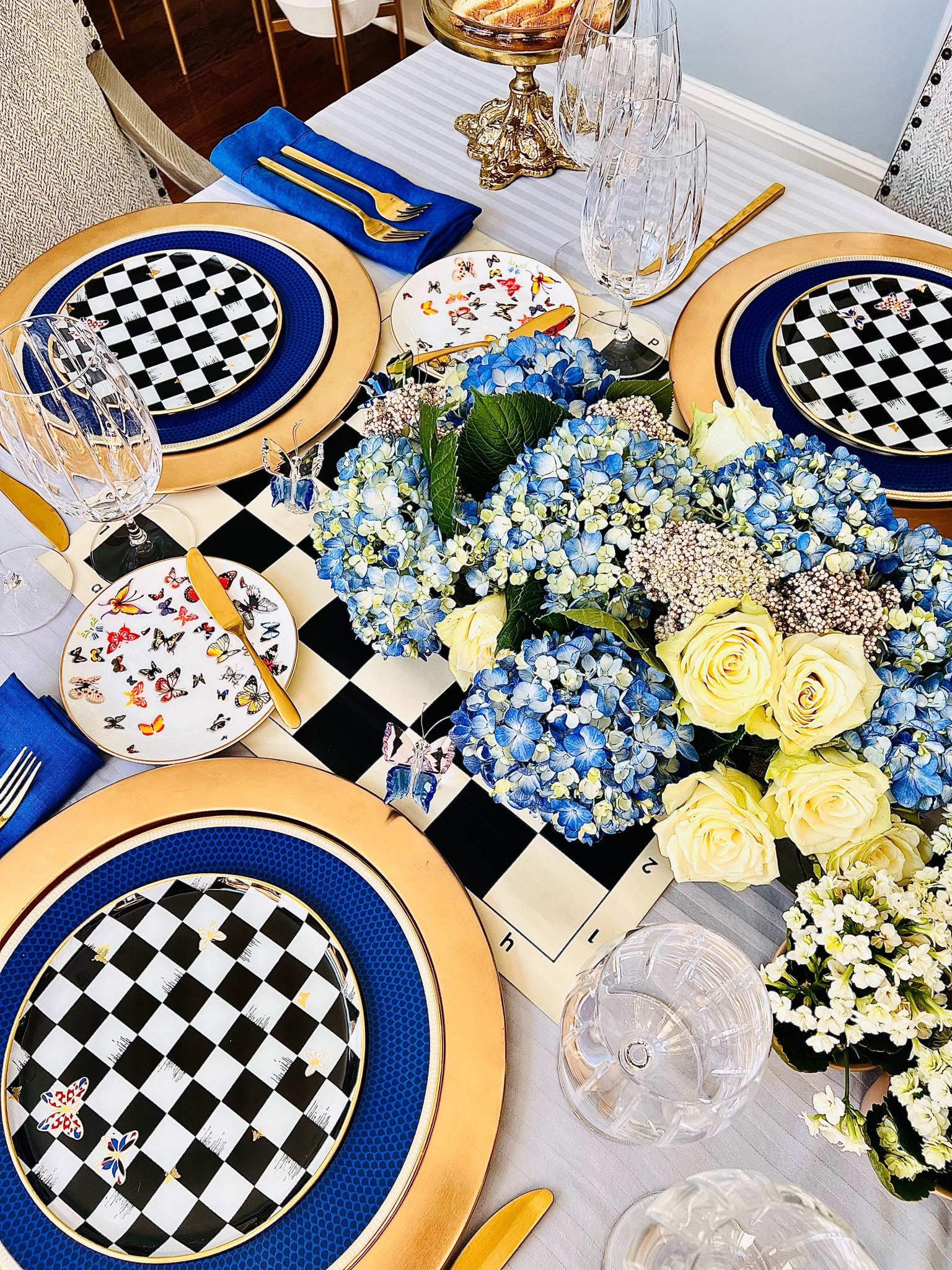 Checkmate and Butterflies 🦋 these plates are ready to create McKenzie childs look without McKenzie childs price tag 
#dupe #mckenziechildsdupe McKenziechildslook #checkeredplates #butterfliesplates  

#LTKhome #LTKFind #LTKGiftGuide