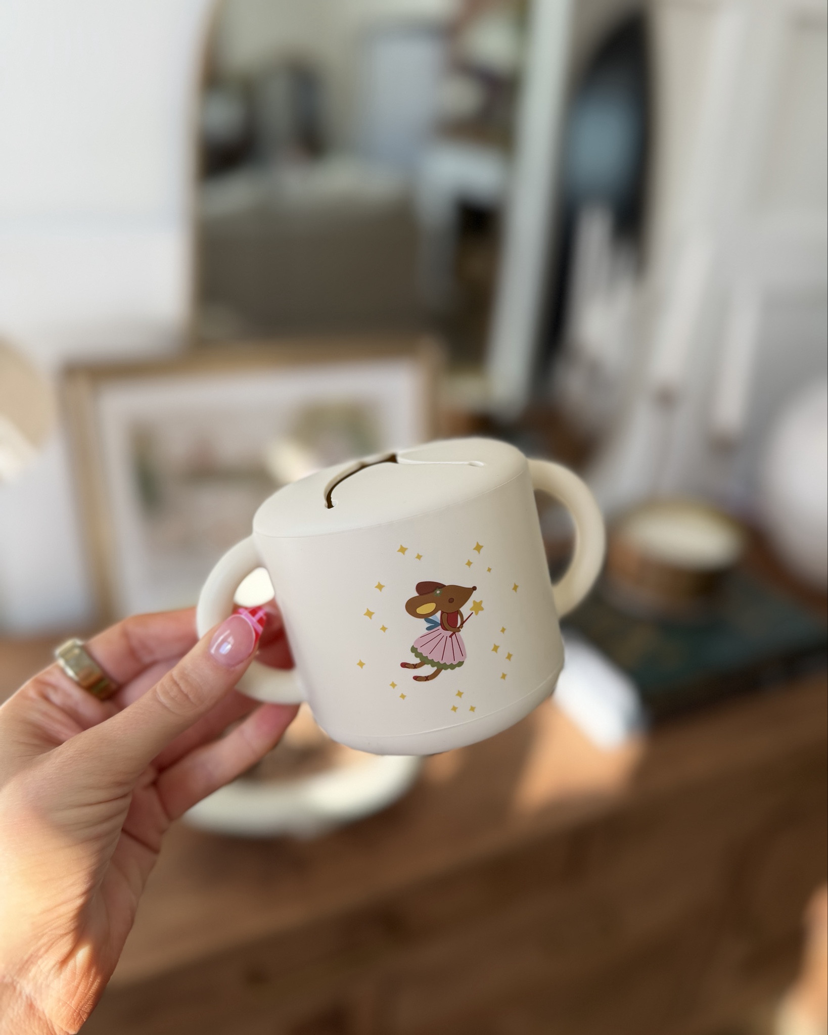 Evelyn’s little mouse fairy snack cup! She’s obsessed with these cups. So easy to give snacks in, especially on the go so they don’t have to hold a bag!! 

Mushie, toddler snack cups, toddler snacks, Amazon find 

#LTKfoodie #LTKmomlife #LTKKids