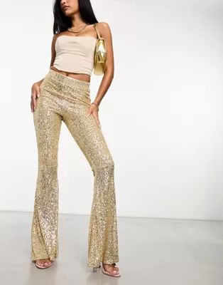 ASOS DESIGN extreme flare sequin trouser in gold | ASOS (Global)