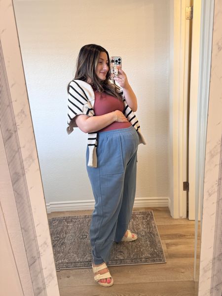 These pants are soo comfortable over the bump! If you’re not pregnant you can wear them lower!! 

Bodysuit: size medium 
Pants: size medium 
Shoes: run TTS
Sweater: size xs 

37 week bump outfit, maternity outfit, petite outfit, loungewear, lounge pants, petite lounge pants, spring, summer, striped sweater

#LTKStyleTip #LTKFindsUnder50 #LTKBump