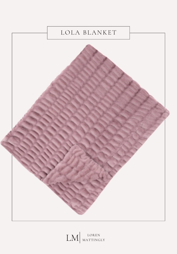 Okay but can we talk about how viral this blanket is right now… because it is everywhere for a reason. 🤍 

The Lola Blanket has completely taken over my feed lately, and once I felt it in person I understood the hype. It is unbelievably soft, the texture is gorgeous, and it instantly makes your living room or bedroom feel more elevated and cozy at the same time.

If you have been influenced like I was, this is your sign. I linked the exact one I have below.

#ltkwinter #ltkcozy #lolablanket