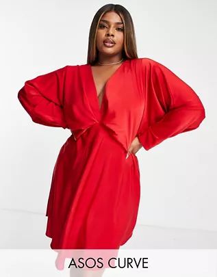 ASOS DESIGN Curve batwing satin mini dress with bias cut skirt and tie back in red | ASOS (Global)