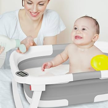 Collapsible Baby Bathtub,Baby Bath Tub with Soft Cushion & Thermometer,Baby Bathtub Newborn to To... | Amazon (US)