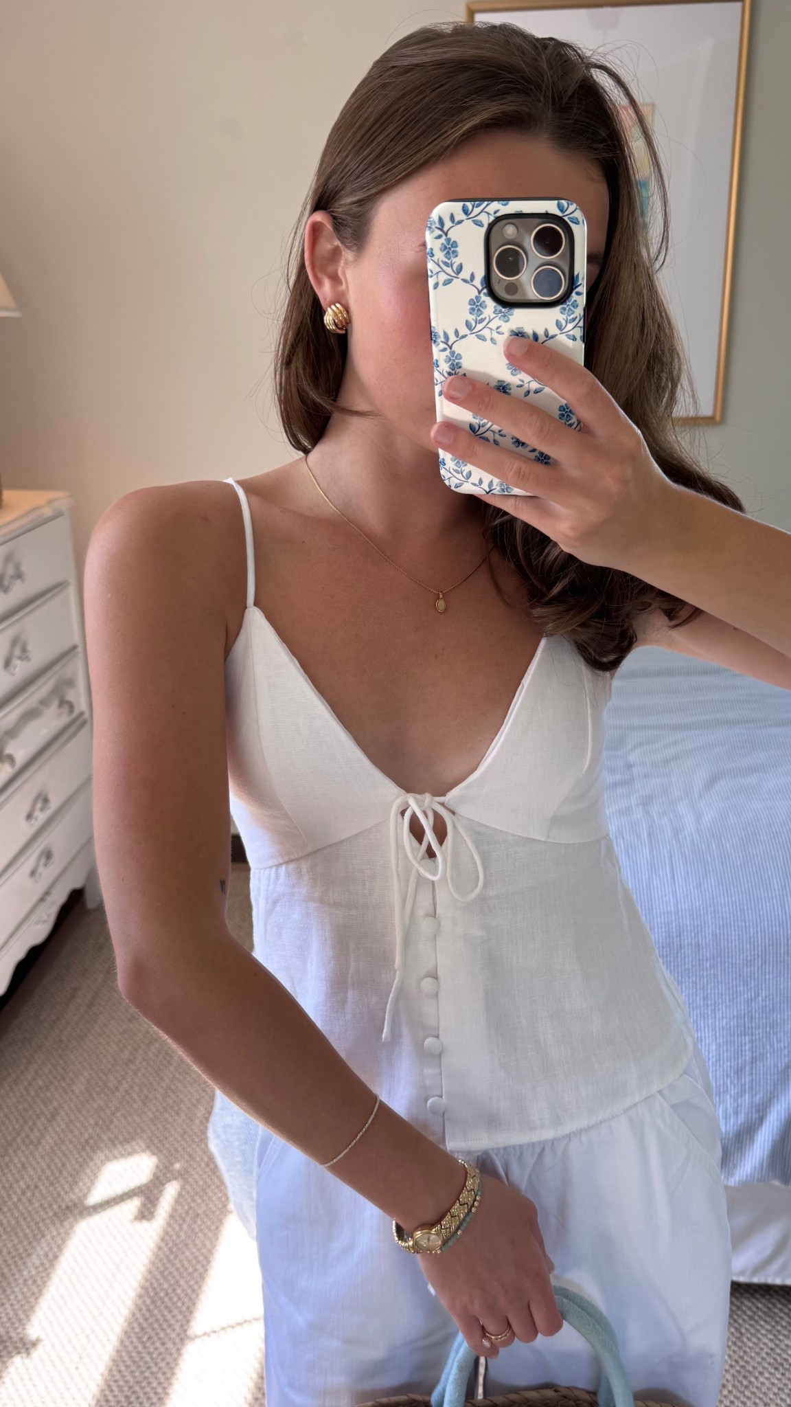 Wearing a size down in this top (XXS) and I’m 5’2” linked another of the same brand top/slightly different since exact is almost sold out! 