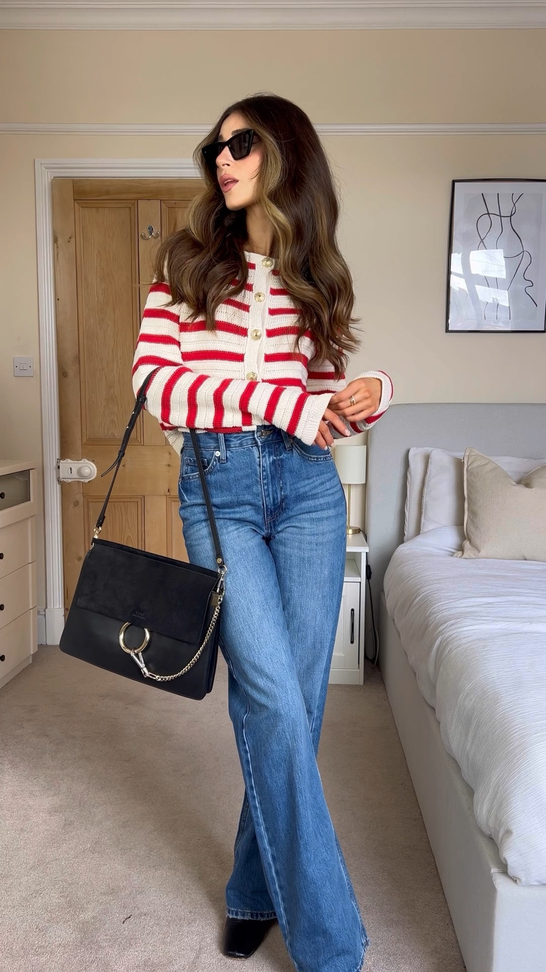 Red stripe cropped cardigan, blue straight jeans (I bought these in Tall and I’m 5’7) black ankle boots, Chloe bag, cat eye sunglasses 🕶️ 

#LTKeurope