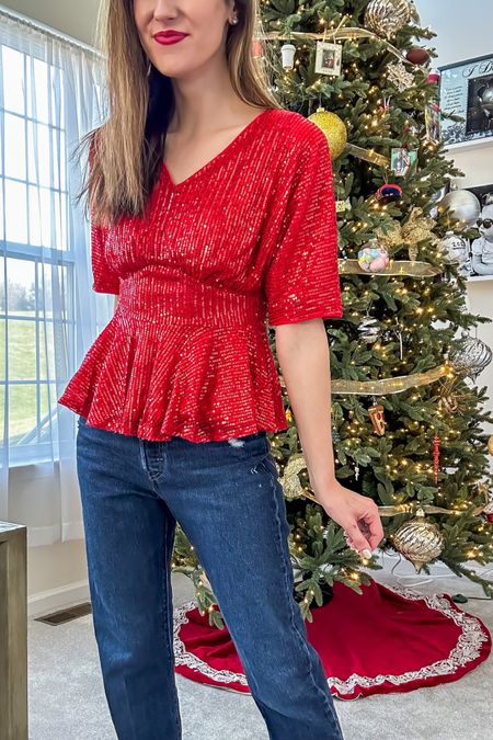 Holiday outfit - sequin top + jeans

Red sequins // holiday party outfit // festive outfit 

#LTKHoliday #LTKparties #LTKstyletip