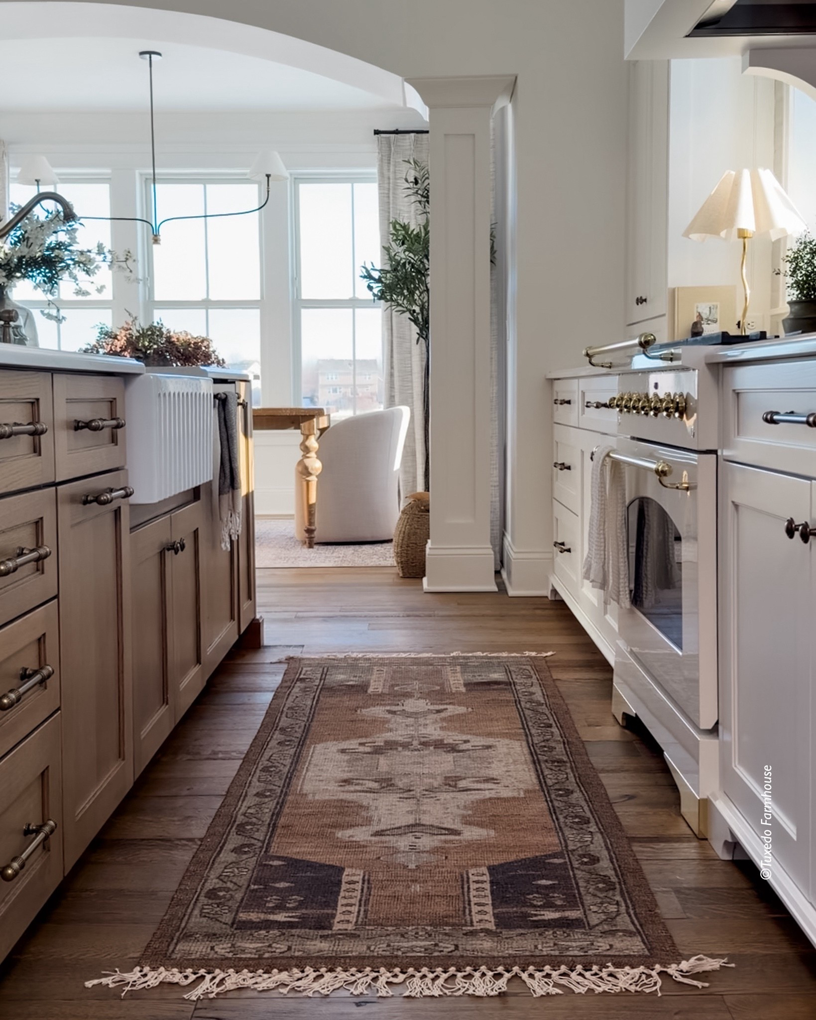 Add a rug with warm tones for a cozy kitchen feel—one that brings in softness underfoot while adding depth and character to the space. I love how a thoughtfully chosen rug can instantly make a kitchen feel more inviting, balancing function with beauty. Warm neutrals and subtle patterning help create that lived-in charm, making even the busiest spaces feel calm and welcoming. It’s such a simple way to layer in comfort and warmth while still keeping everything feeling timeless and effortless. 

 #LTKSeasonal #LTKHome