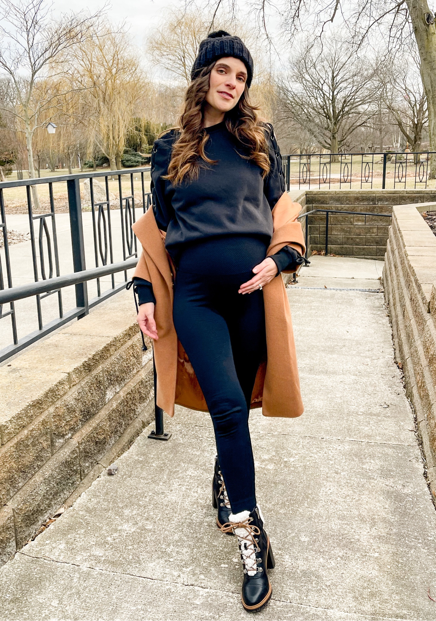 All black winter outfit. Amazon lace up sweatshirt fits tts. I linked a similar pair of boots, hat & leggings.

#LTKSeasonal #LTKunder50 #LTKbump