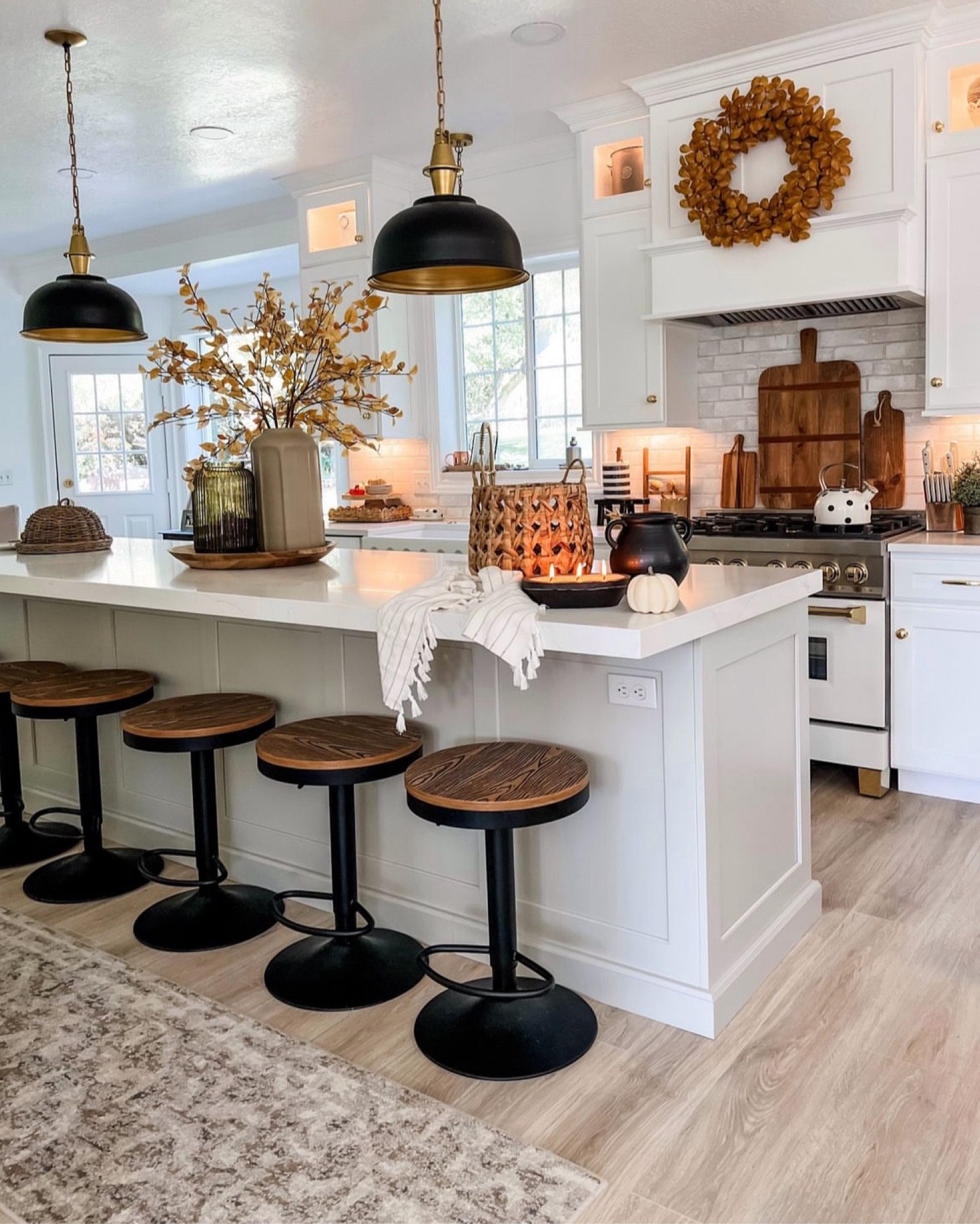 Beautiful and cottage modern cottage farmhouse. Fall and autumn are lovely in my kitchen. Wreath, leaf stems, baskets, boards candles, rugs and more 

#LTKFallSale #LTKHome #LTKSeasonal