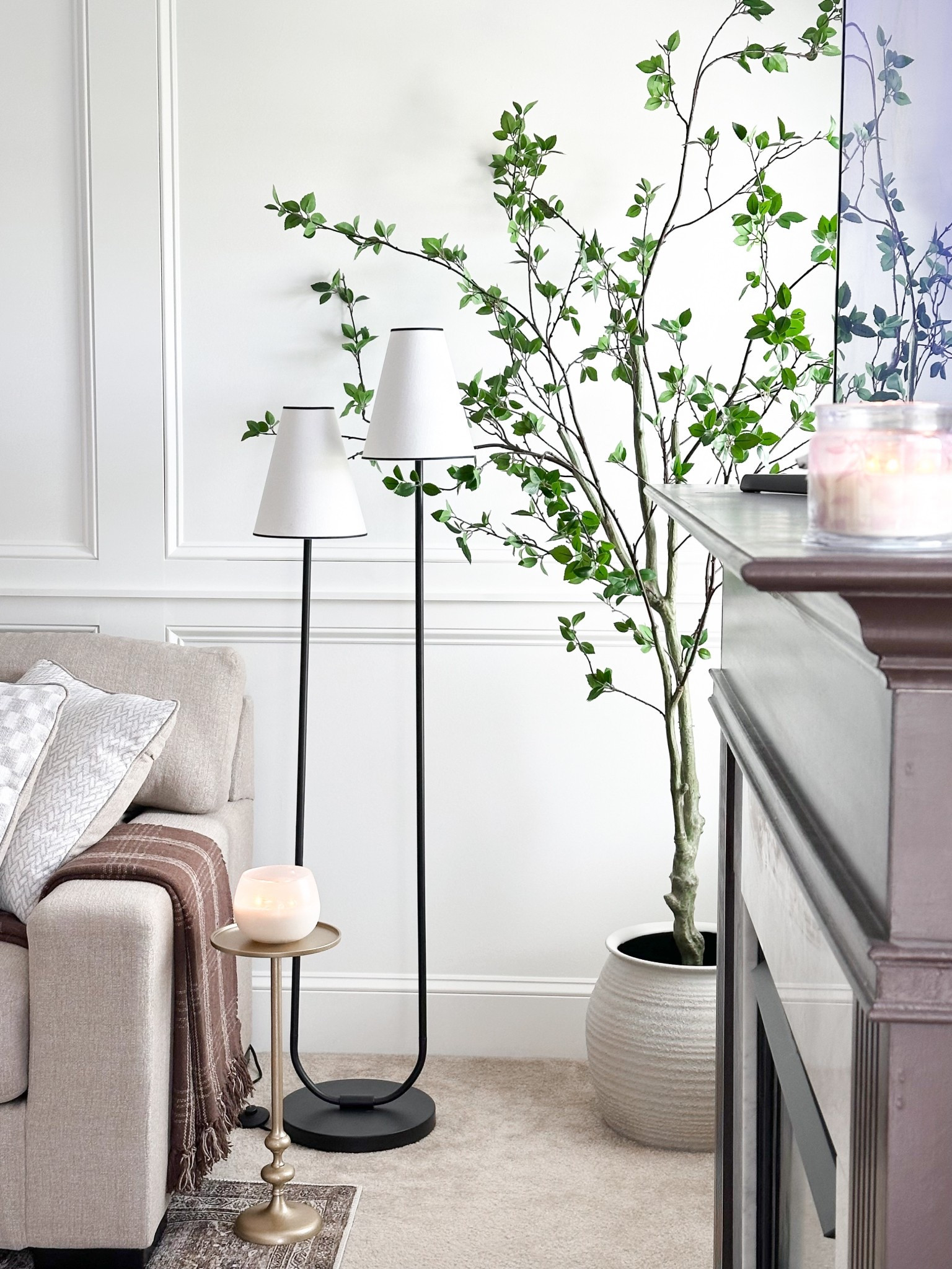 This gorgeous faux tree turned this weird awkward corner into the cutest little nook in our living room! It’s the most realistic artificial tree I own! I was looking for something a little different than the olive trees that I’ve used elsewhere in my house and this is perfection! It’s on sale at Home Depot right now with code Bedroom10!




#transitionaldesign #neutralhome #mcgeestyle #affordablehome

#LTKSaleAlert #LTKSeasonal #LTKHome