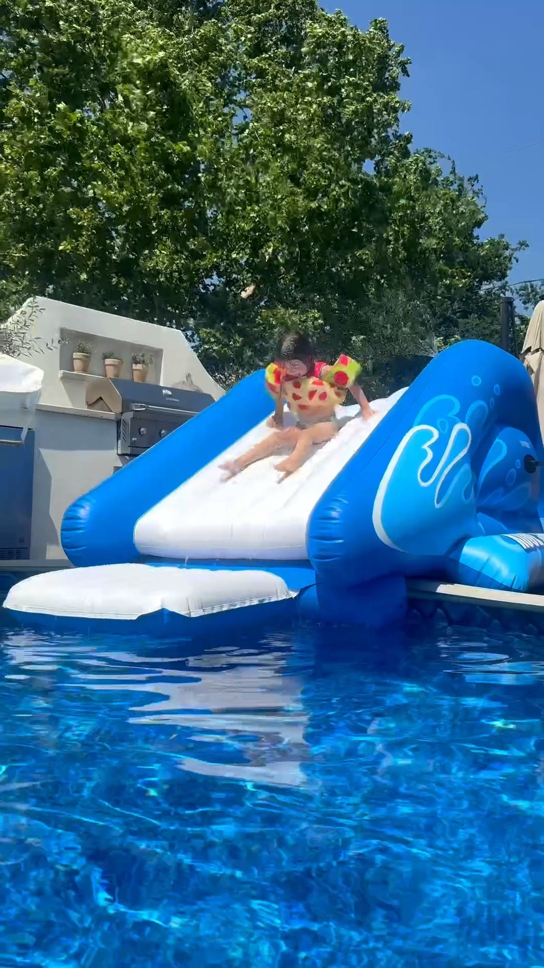 #ad This slide has entertained Olive many mornings while I sit on those lounge chairs and enjoy my coffee!! I found it best priced on @Wayfair #wayfair #wayfairpartner

#LTKHome #LTKSwim #LTKKids