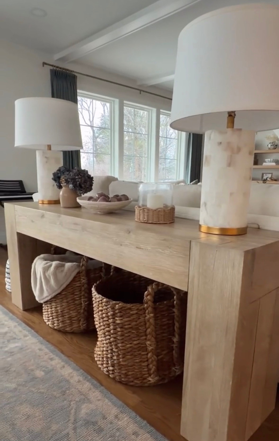 Loving the way these new baskets from Target look under my console table. Great for storing extra blankets or pillows!

#LTKFindsUnder100 #LTKHome