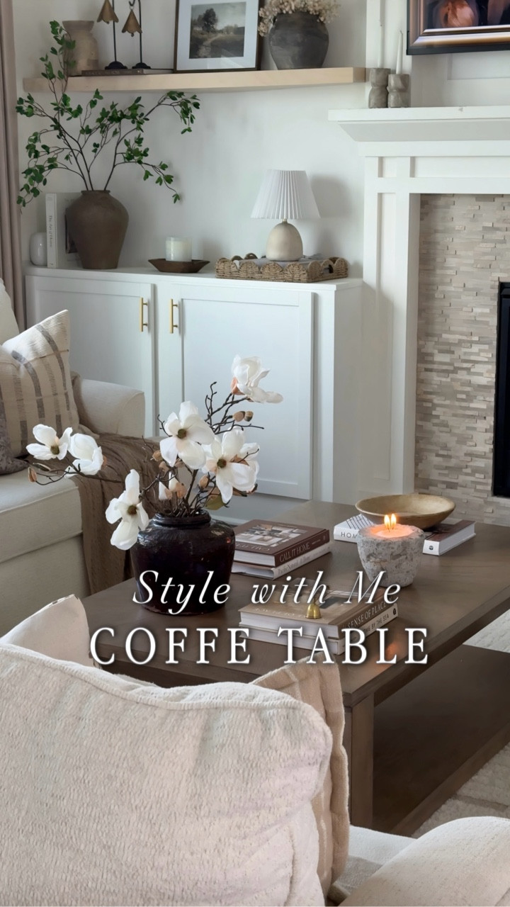 I wanted to do a little refresh styling my new coffee table.🕯️
I love how it grounds the space adding so much warmth and character to this room.🤎 I kept the styling simple with magnolia's blooms, organic textures, and a earthy accents—just enough to invite in that cozy, transitioning vibe from late summer towards fall. 

It’s amazing how one piece can change the whole feel of a room.

#homedecor #interiordesign #homedecoration #homestyle #coffeetable #homestyling #homedesign #stylewithme #interiordesigner #neutralhome #vintage #homedecorinspo