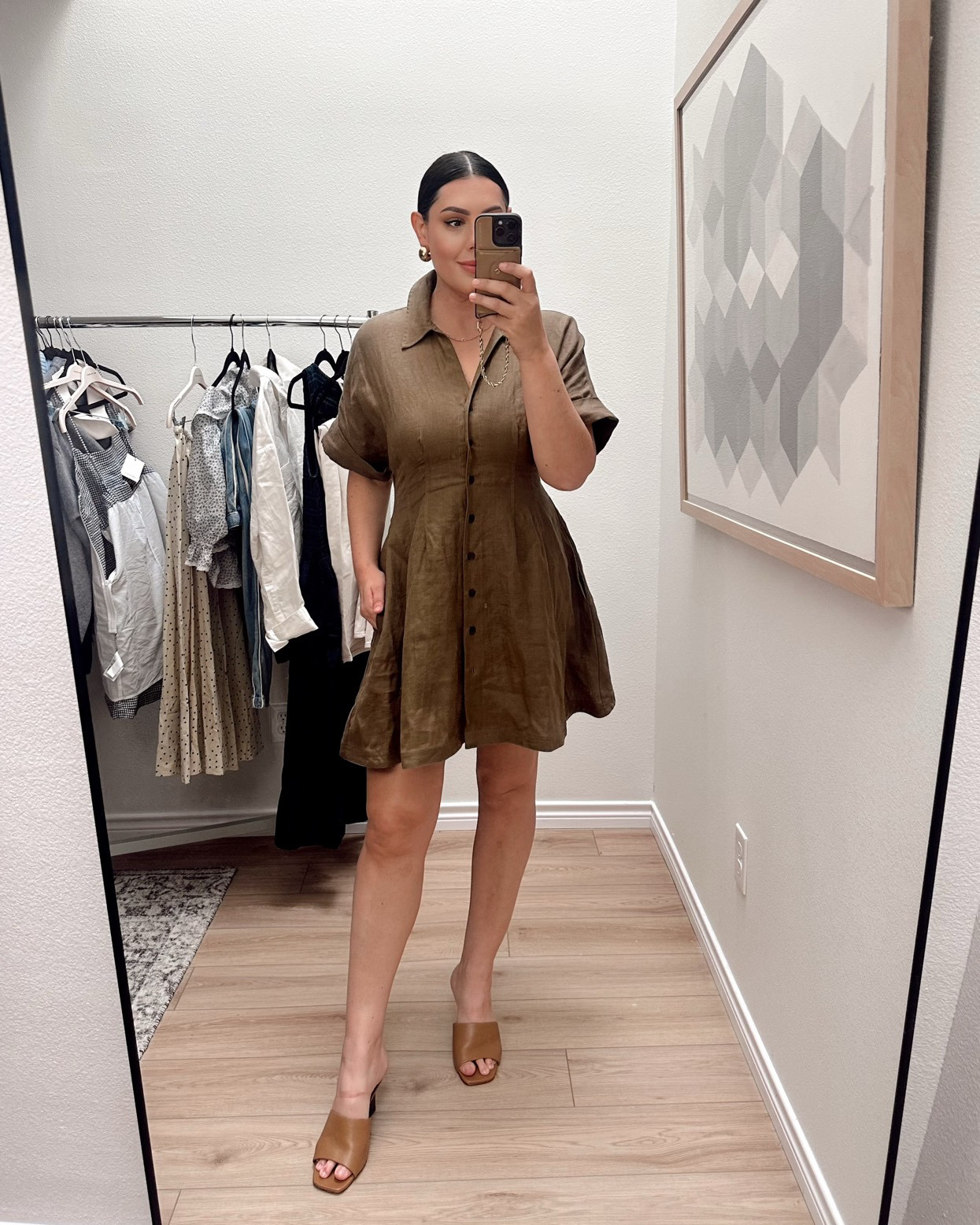 Loved this dress way more in person than online! The fabric is linen and it’s a great weight as well, kind of a mid-weight linen, definitely not sheer and it holds structure well. Which is great because this dress has the best shape! It comes in at my natural waist and the flounces out around my hips. It’s a really nice shape for bigger boobs too! 

I’m in the large – I’m in between medium and large at Madewell right now. The medium was too tight on my boobs but the large is a touch too big overall, but I went with this size.   

 