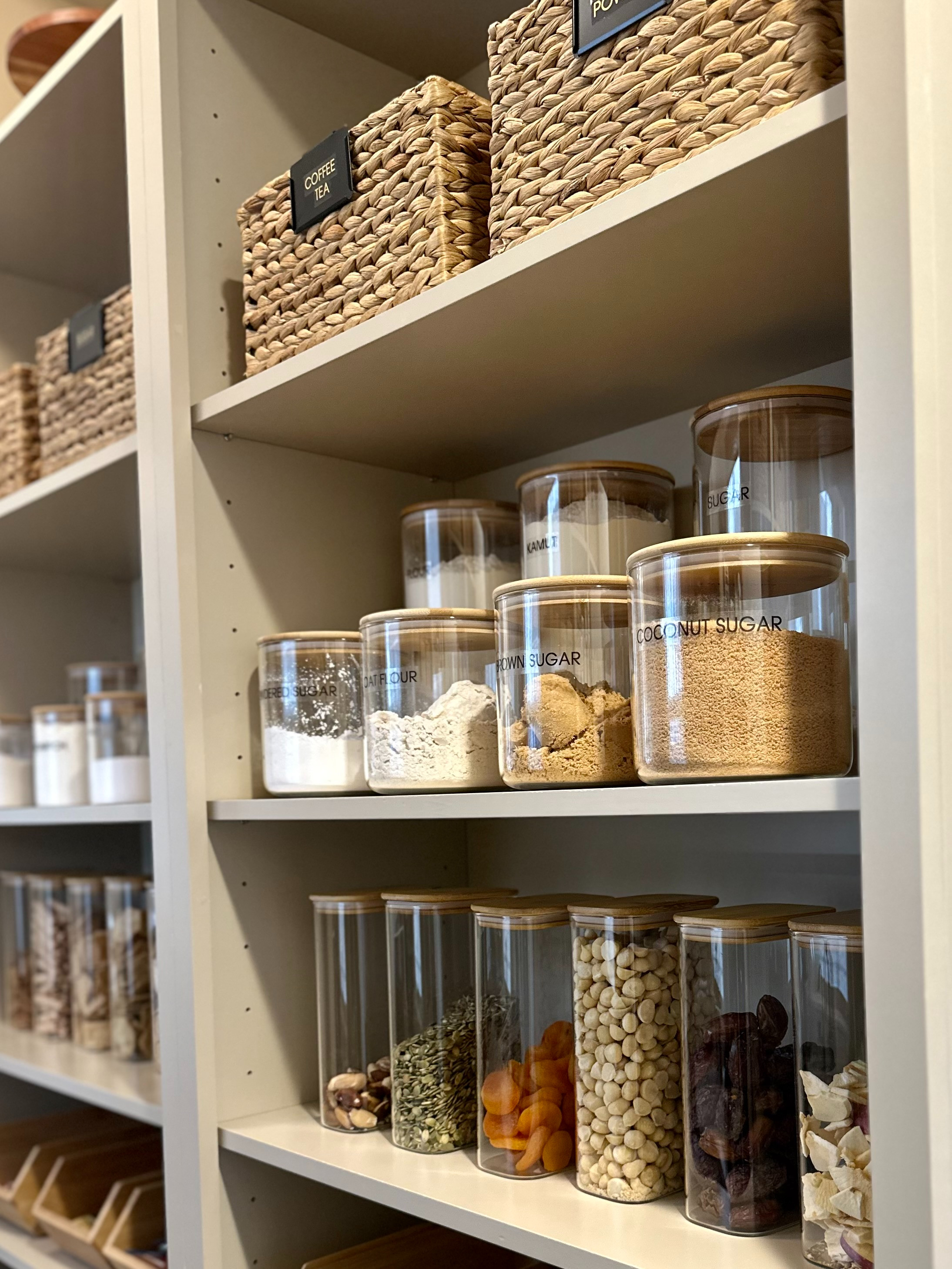 Don't want plastic touching your food? No problem!  There are so many beautiful glass jars to choose from these days.  The snack canisters are my favorite! Gorgeous #plasticfree pantry. 

 #LTKHome #LTKFamily