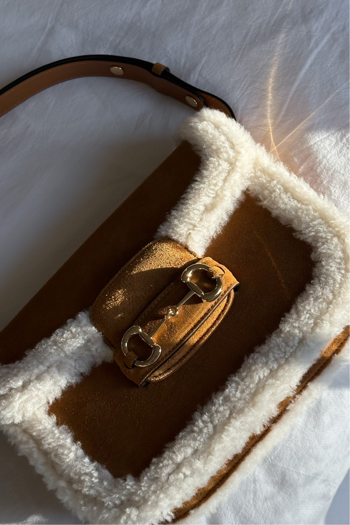 Gucci shearling & suede perfection!!! On sale on re-bag right now for Valentine’s Day 🫶🏼

#LTKItBag #LTKSaleAlert #LTKSeasonal