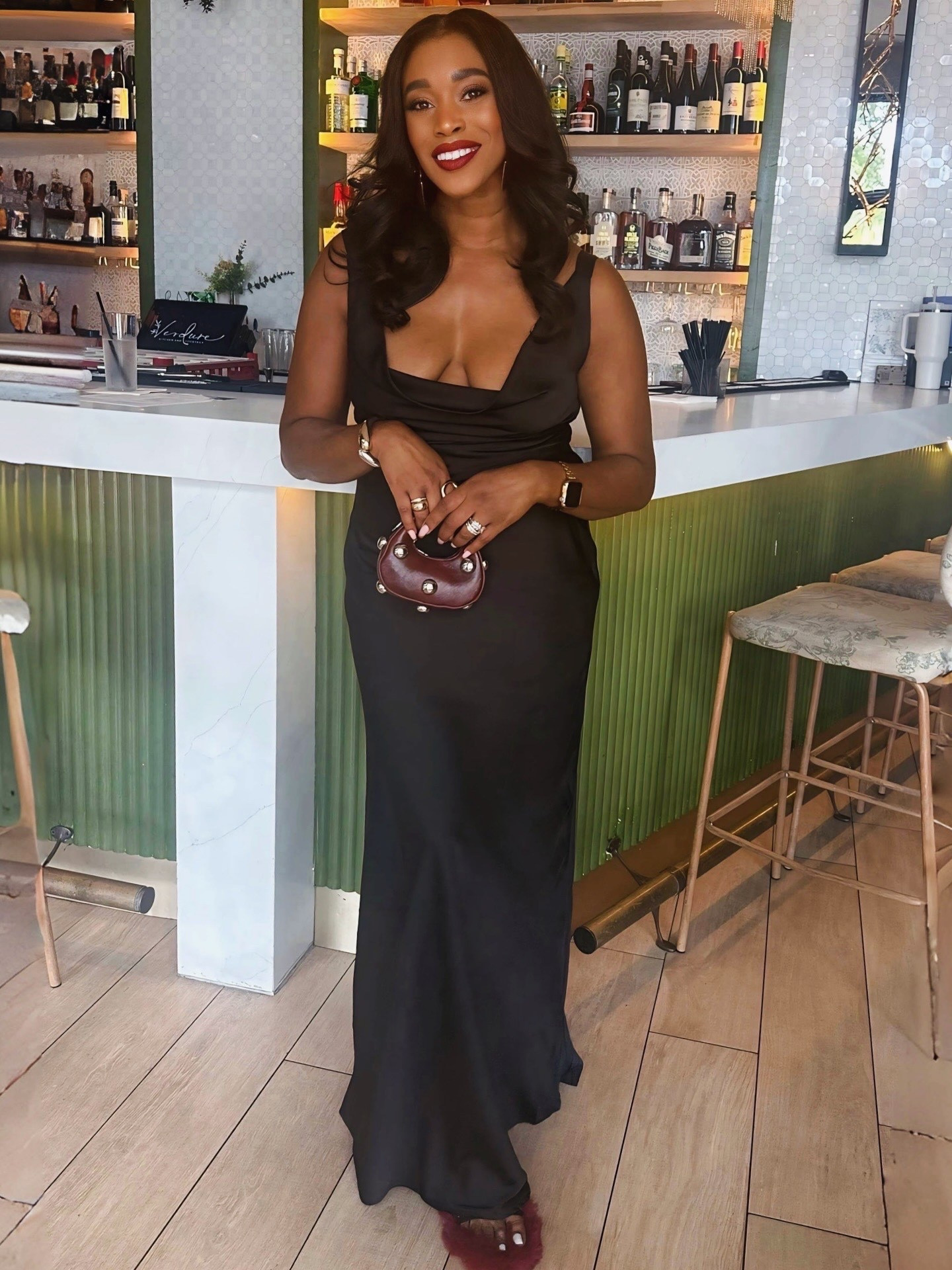 Elevated elegance in timeless black. This sleek slip dress is a wardrobe essential that transitions seamlessly from dinner dates to evening events. I paired it with a statement mini bag and bold heels in rich burgundy tones for the perfect pop of color. Effortless, chic, and sophisticated. 

#LTKShoeCrush #LTKStyleTip #LTKFindsUnder50