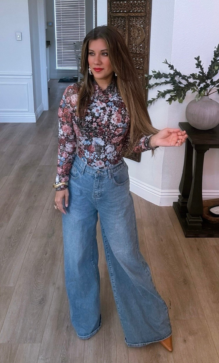 Casual jeans and a cute floral long sleeve top  

#LTKSeasonal #LTKSaleAlert #LTKHoliday