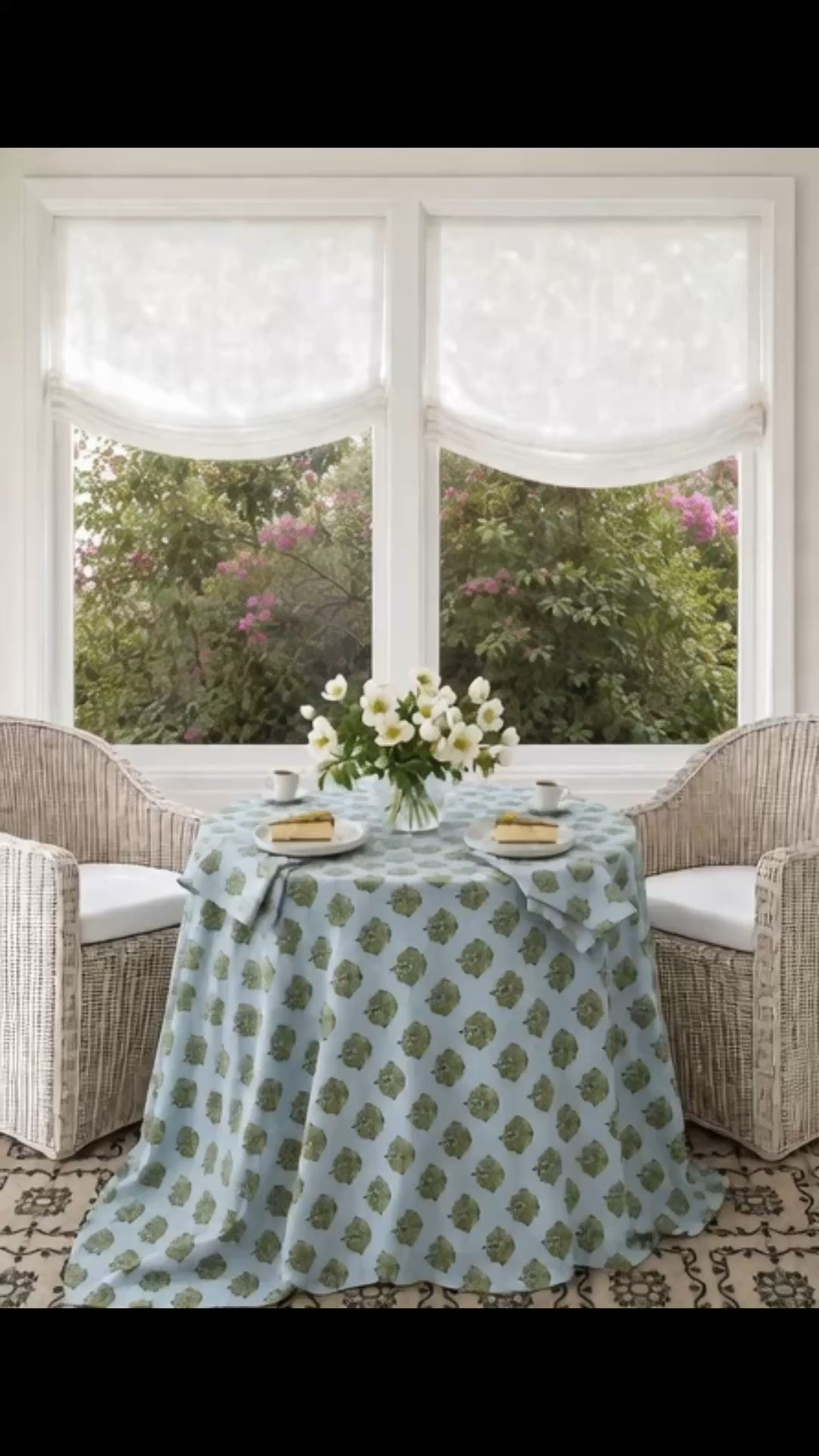 Saturday morning coffee, with soft sunshine filtering through the sheer Roman shades and the patio feeling bright, peaceful, and beautifully layered. ☀️☕️

This new Serena & Lily tablecloth brings such a lovely pattern and color to the space. I love how the soft blue and green palette feels light enough for late summer, while the added fabric begins to create that cozy transition into fall.

As the season starts to shift, I find myself adding more texture and layers outdoors—a beautiful table linen, an elegant patterned rug, and soft window treatments that gently filter the morning sun. These simple additions make the patio feel warmer, more inviting, and ready for all the coffee mornings and gatherings ahead.

#SaturdayMorning #MorningCoffee #CoffeeMoment #PatioStyle #OutdoorLiving #SerenaAndLily #Tablecloth #TableLinen #SheerRomanShade #RomanShade #OutdoorRug #LayeredDecor #TransitionalDecor #FallTransition #CozyHome #ElegantHome #CoastalStyle #OutdoorDecor

#LTKHome #LTKDayInMyLife

#LTKdayinmylife #LTKHome