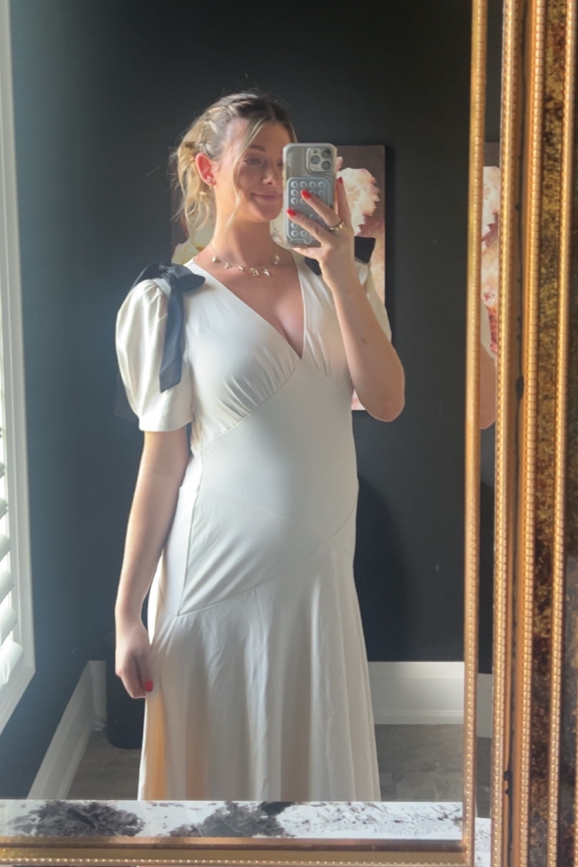 Obsessed with this dress! I got a size L at 25 weeks pregnant, it was a little large but still did the trick 🤍

#LTKbump #LTKSeasonal #LTKwedding