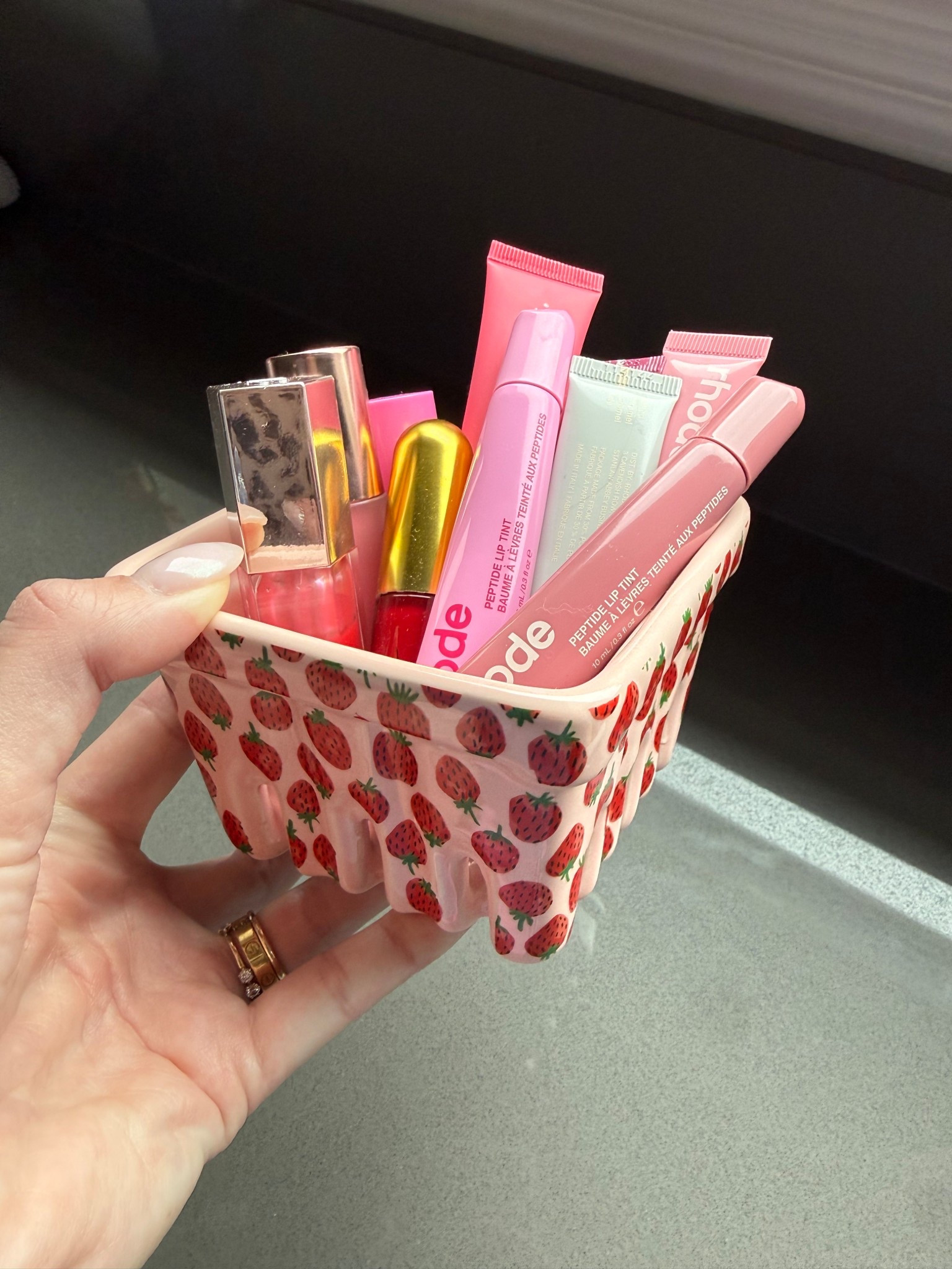 How cute is this strawberry berry container to hold lip gloss!

#LTKgrwm #LTKBeauty