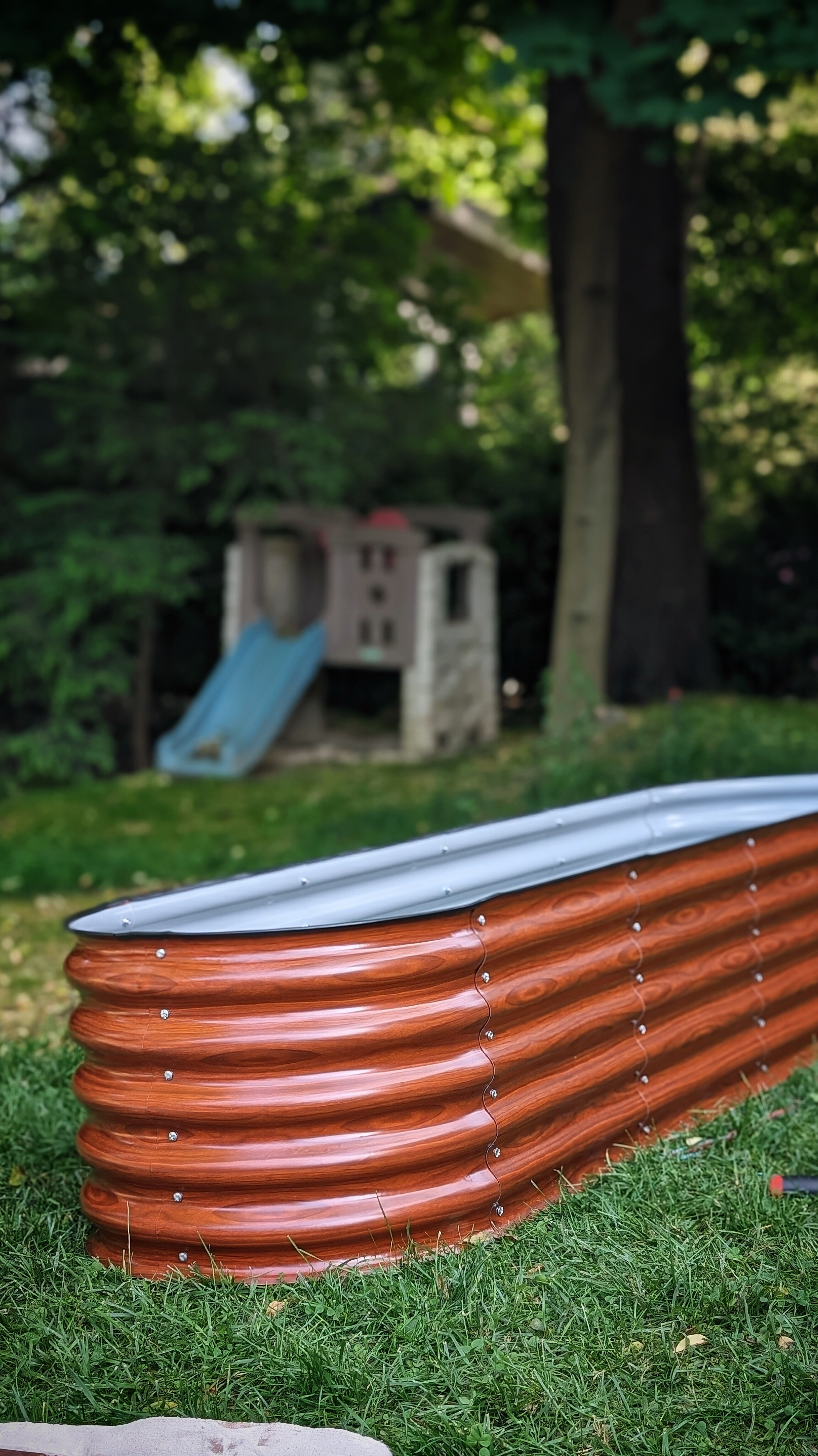 We needed a home for our first veggie garden at Charlotte House, so we picked up this raised planter just in time for Memorial Day It's got a faux wood look, but it's made of metal and is a dupe that's half the price of the more expensive brand!

#LTKhome #LTKSeasonal #LTKfamily