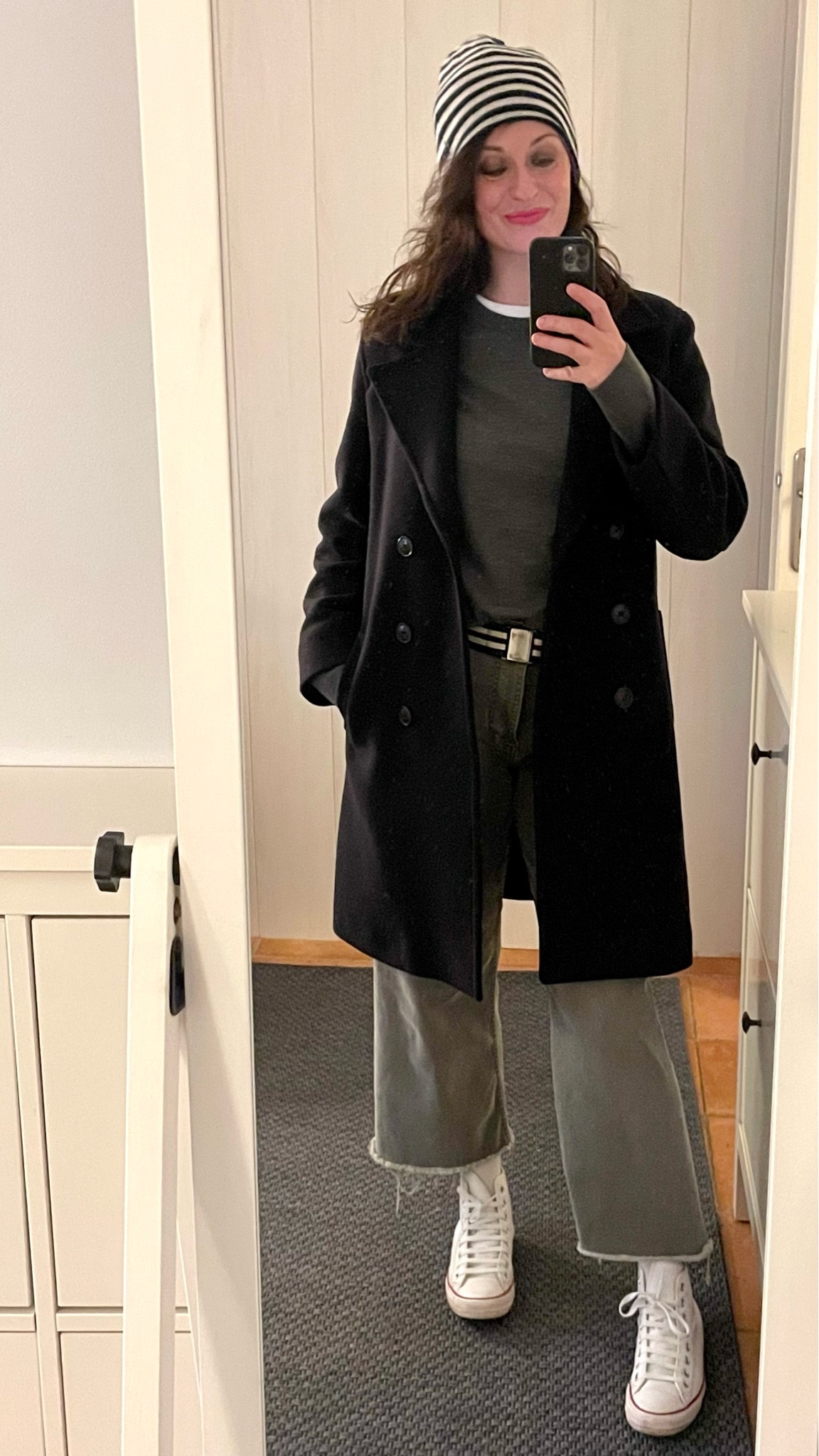 Striped cashmere beanie #cyrillus / Navy peacoat #pablo / Grey merino wool jumper #uniqlomen / White t-shirt #fruitoftheloom / Striped canvas belt #hm / Khaki barrel jeans #kiabi / White leather Chuck Taylor high tops #converse

#LTKmidsize #LTKover40 #LTKeurope