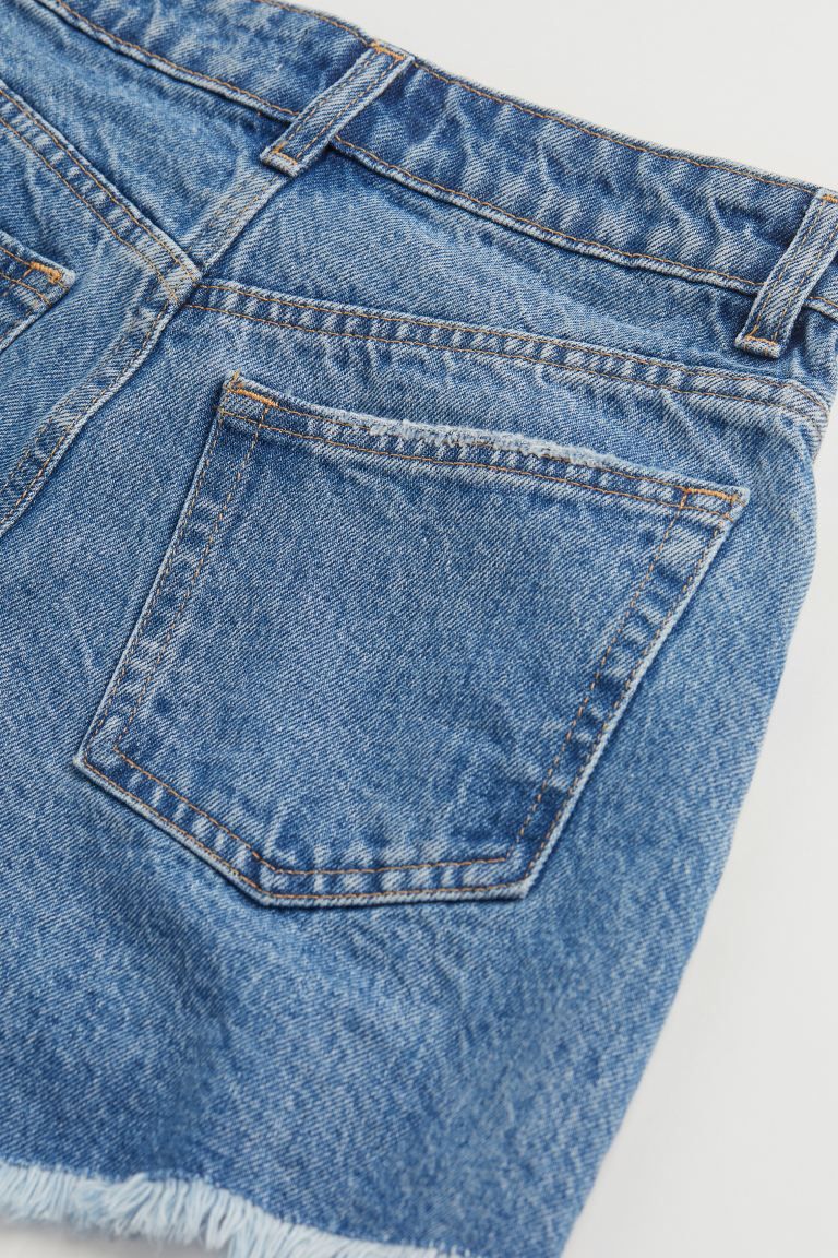 5-pocket shorts in washed cotton denim with heavily distressed details. Regular waist, button fly... | H&M (US + CA)