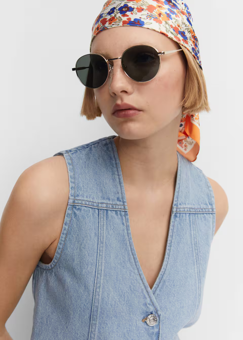 Round metal-rimmed sunglasses -  Women | Mango USA | MANGO (US)
