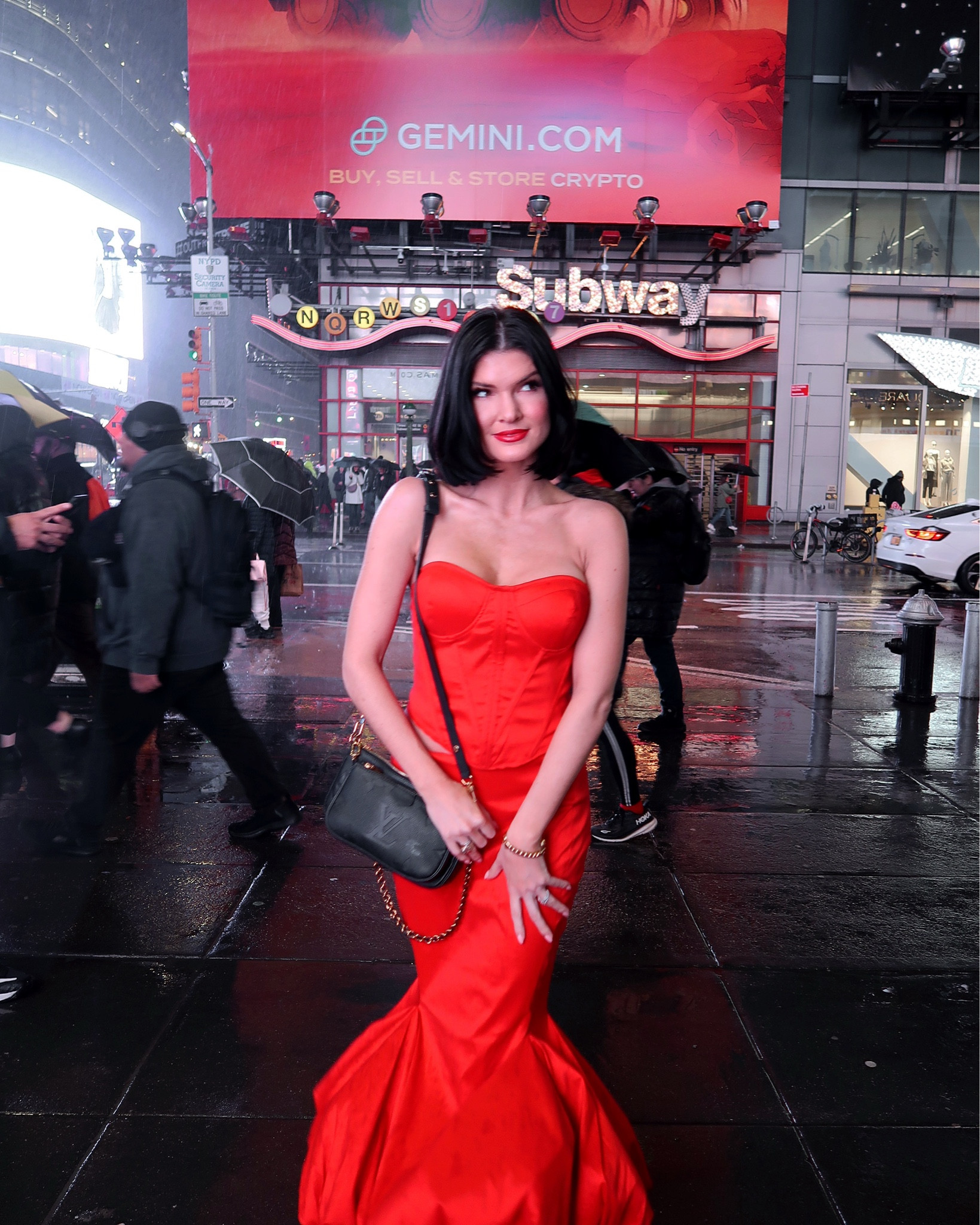 Red corset dress with red kitten heels and bold red dior lip 