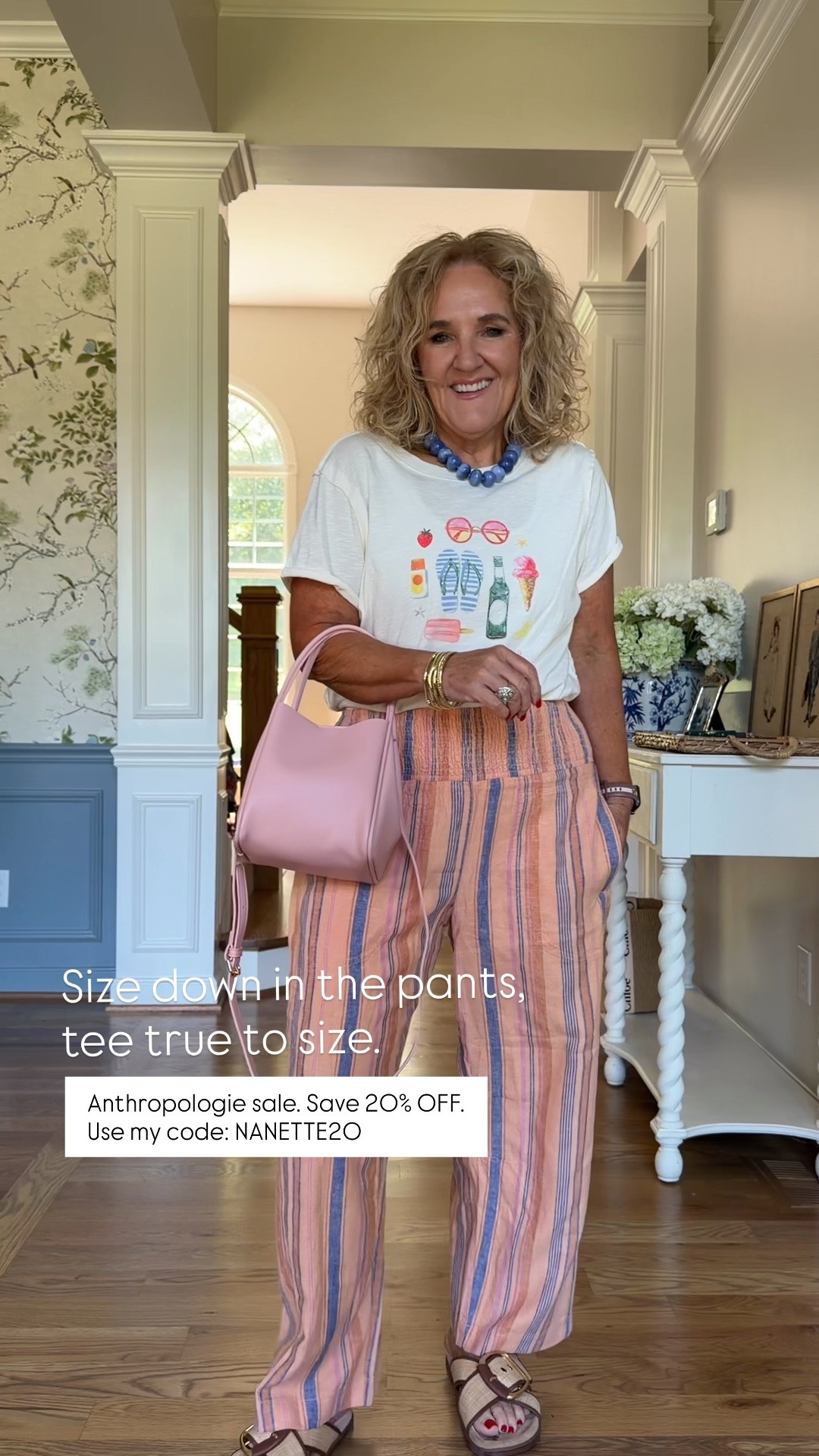✨ Save 20% off orders of $100+ at Anthropologie with code NANETTE20.

This colorful summer outfit is one of my favorites! The graphic tee adds a fun pop of personality, while the breezy striped pants keep the look light and comfortable. I recommend sizing down in the pants and taking your true size in the tee. The pink bag and blue accessories pull everything together for the perfect vacation, brunch, or weekend outfit.

💡 LTK MADE EASY
❤️ Heart = Support my posts!
🔖 Save = Get sale & restock alerts
📋 Lists = Keep your favorites organized
💬 Comment if you have sizing questions!

#LTKootd #LTKOver40 #LTKSaleAlert
