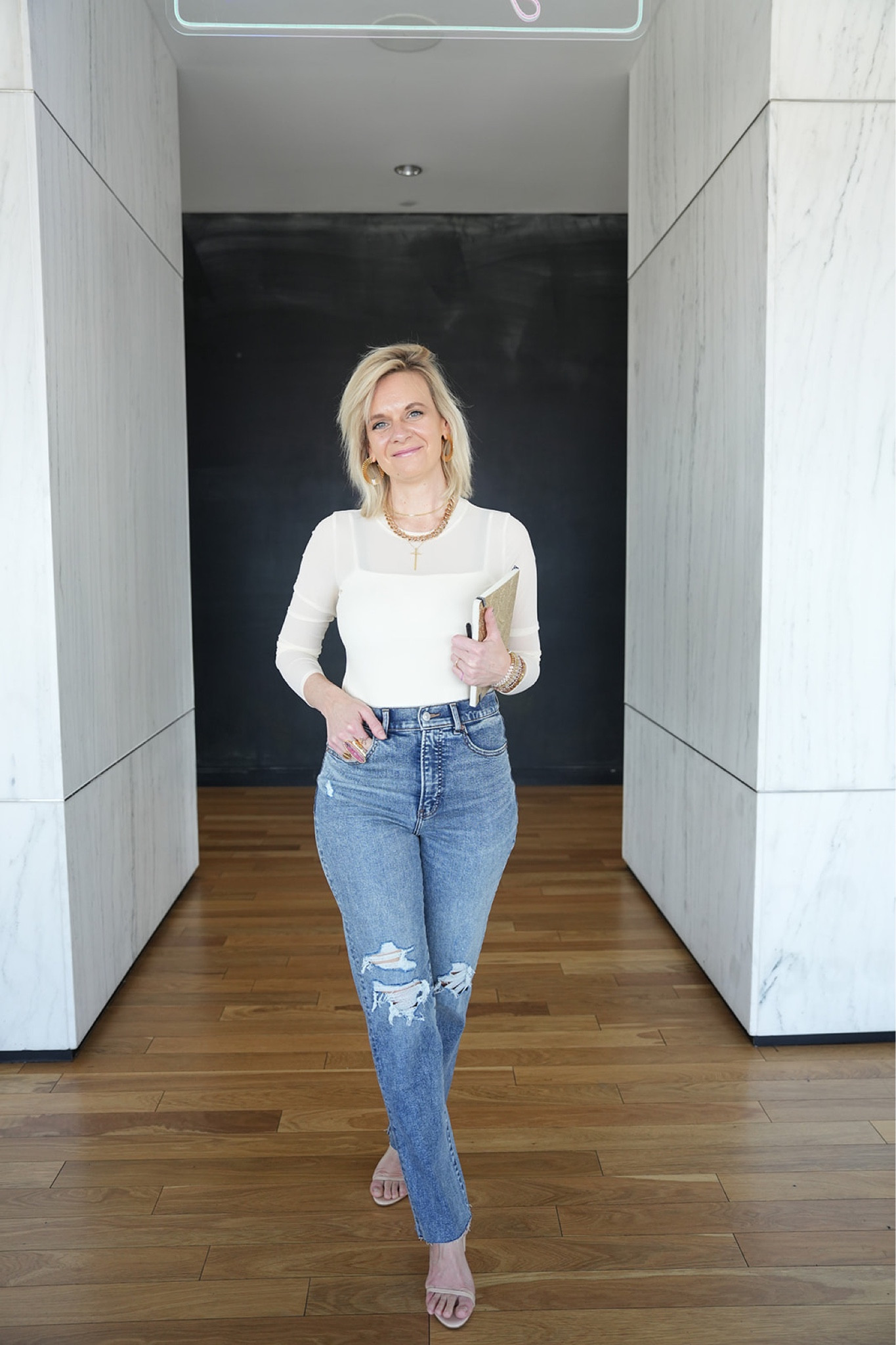 Love this mesh bodysuit from Express!!  Comes in a handful of colors and is so pretty on!  Pair with the matching camisole underneath like Katie has done here for more coverage.

#LTKstyletip #LTKfindsunder100 #LTKSeasonal